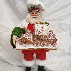 Festive Santa Claus Figurine with Gingerbread Train